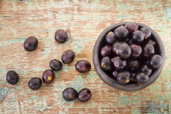 Acai Berries on a Rustic Table