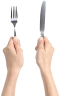 Hands Holding a Fork and a Knife